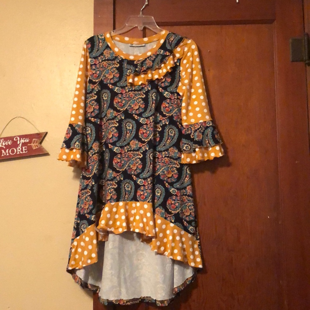Woman’s paisley and mustard dot tunic